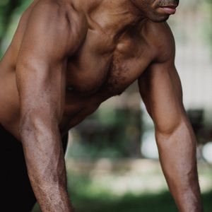 Dynamic shot of a man in mid-push-up.